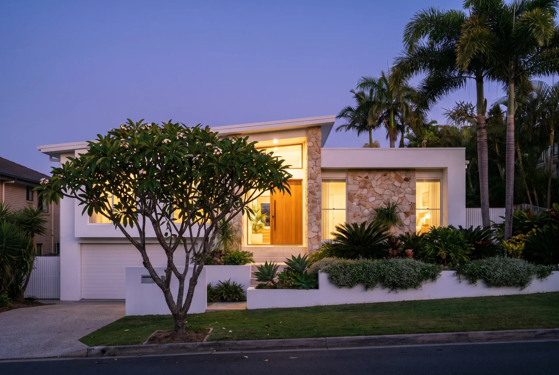 Modern Queensland coastal home at dusk