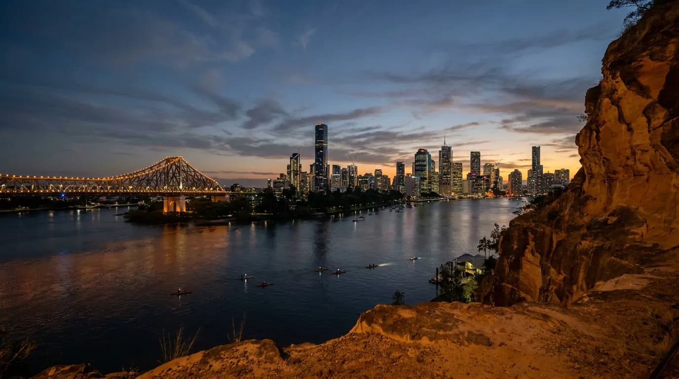 Kangaroo Point cliffs with the Story Bridge and Brisbane CBD skyline at dusk